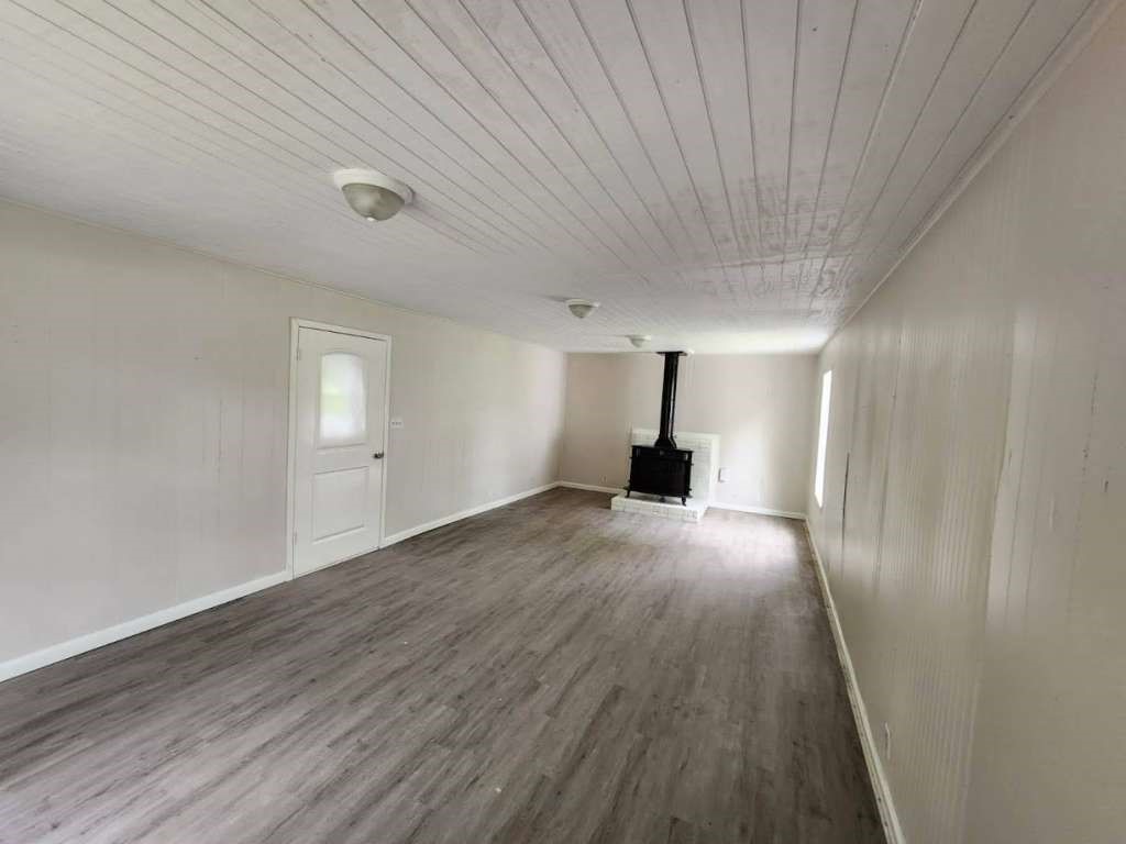 1329 Adams Road Bay City, TX 77414 - Photo 8 of 13 a view of empty room with wooden floor