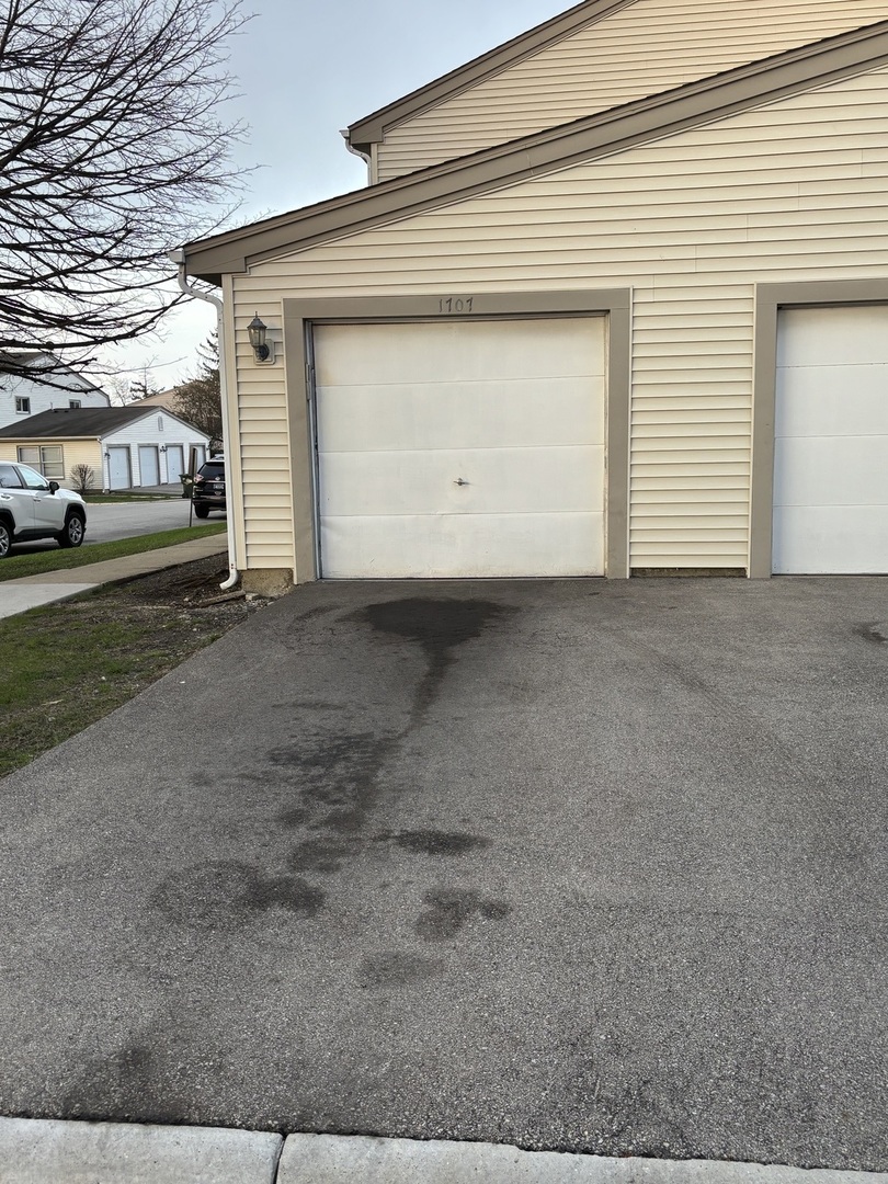 a view of parking space and a parking space