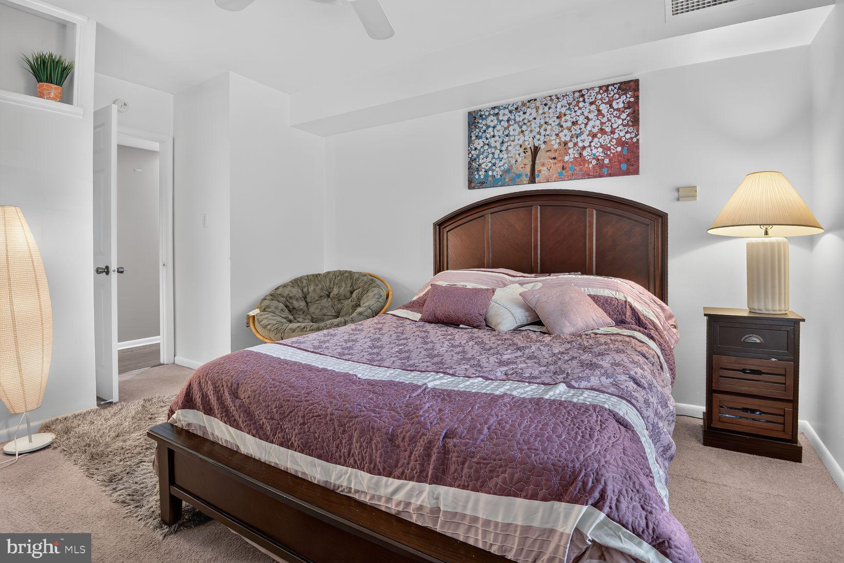 Serene bedroom with cozy ambiance.