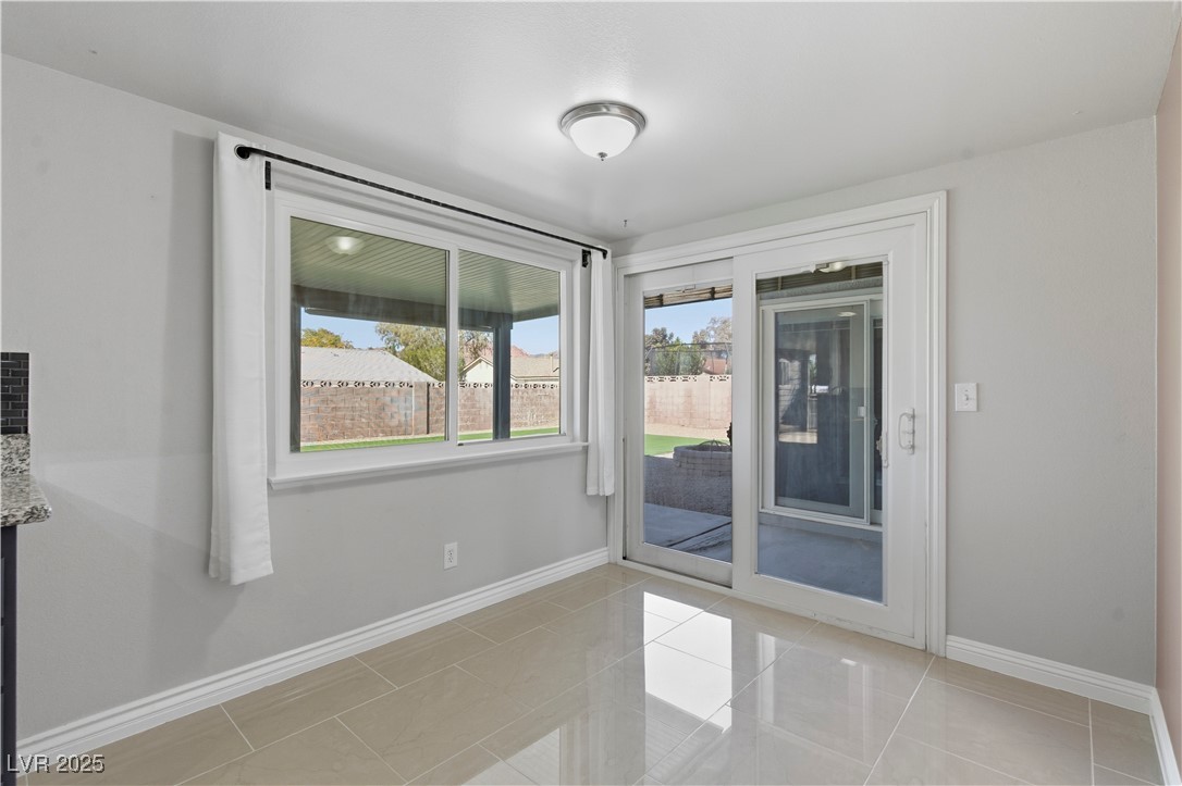 782 Darlene Way Boulder City, NV 89005 - Photo 15 of 39 Unfurnished room with light tile patterned flooring