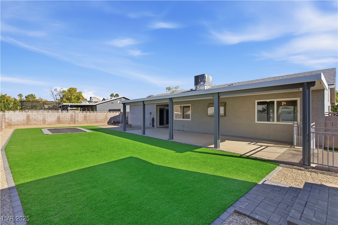 782 Darlene Way Boulder City, NV 89005 - Photo 32 of 39 Rear view of property with a patio, a fenced backyard, and stucco siding