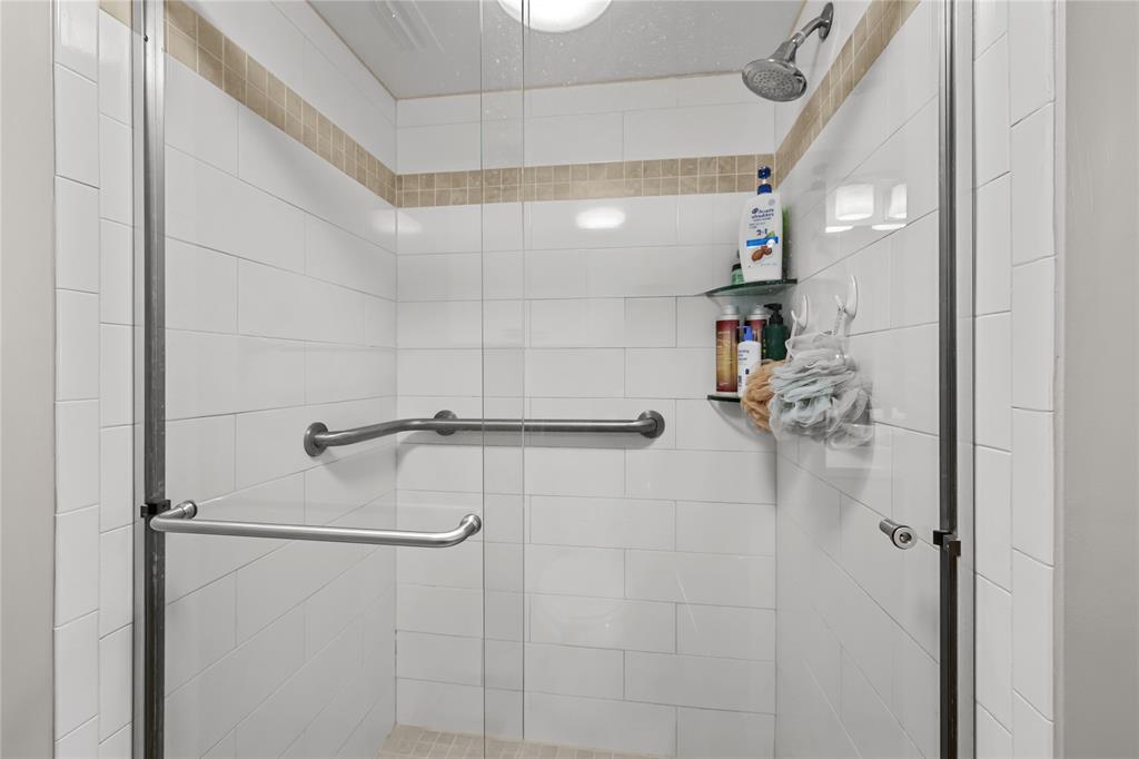 808 Southeast 7th Street, Unit 105B Deerfield Beach, FL 33441 - Photo 30 of 43 a bathroom with a shower