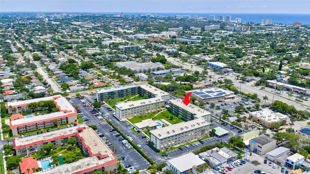 808 Southeast 7th Street, Unit 105B Deerfield Beach, FL 33441 - Photo 42 of 43 an aerial view of residential houses with outdoor space and street view