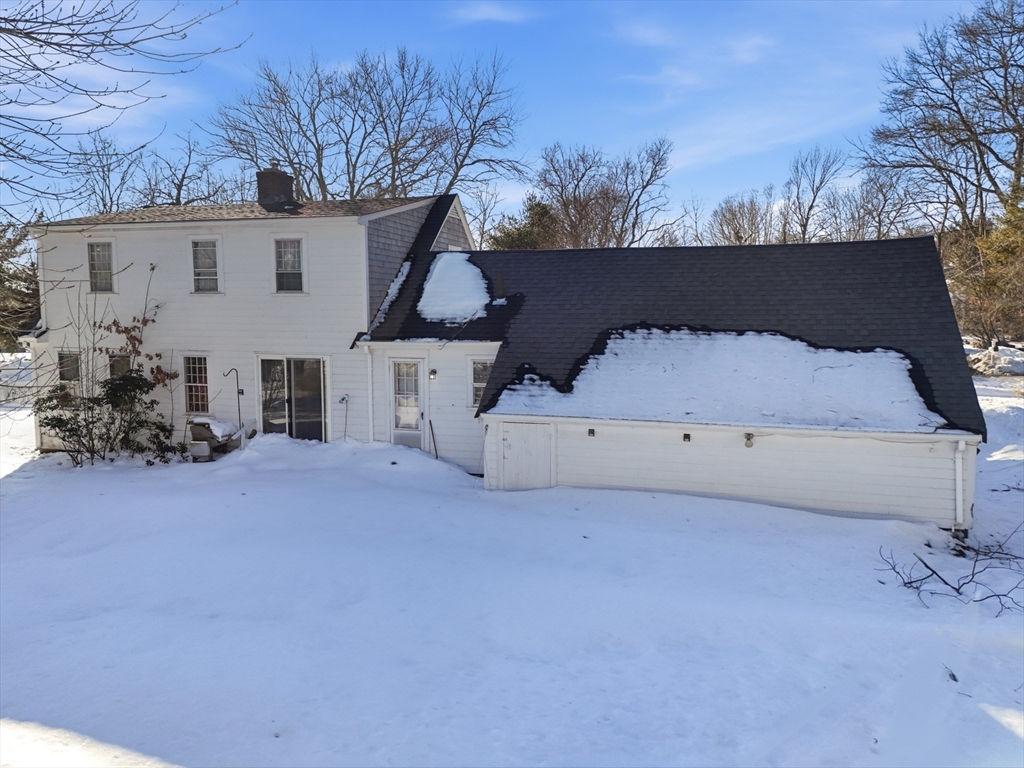 34 Cudworth Road Scituate, MA 02066 - Photo 2 of 3 a view of a house with a backyard and tree