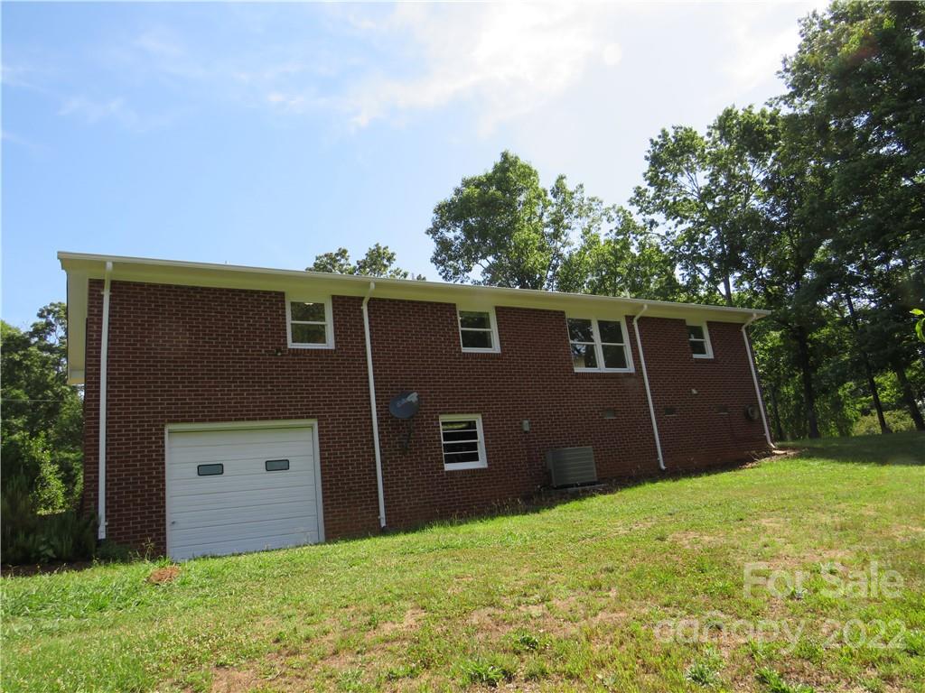 156 Eskimo Drive Bostic, NC 28018 - Photo 20 of 25 front view of a house with a yard