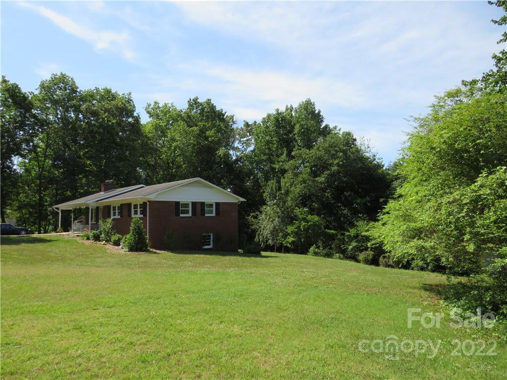 156 Eskimo Drive Bostic, NC 28018 - Photo 23 of 25 a view of a house with a yard