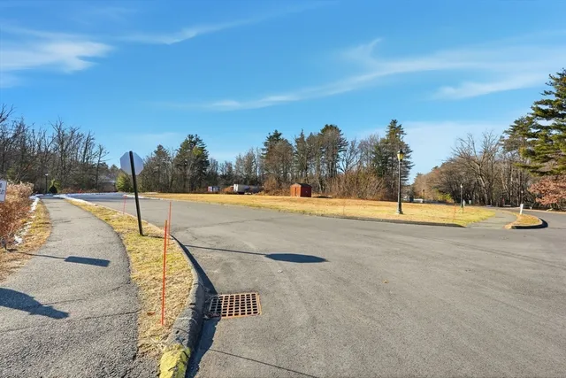 a view of a swimming pool with an outdoor seating