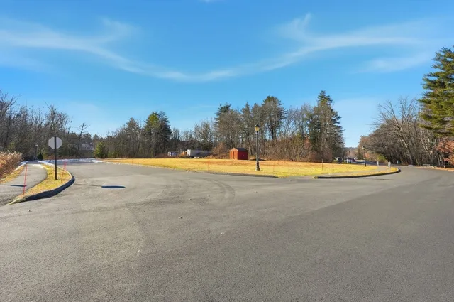 a view of a swimming pool with an outdoor space and seating area