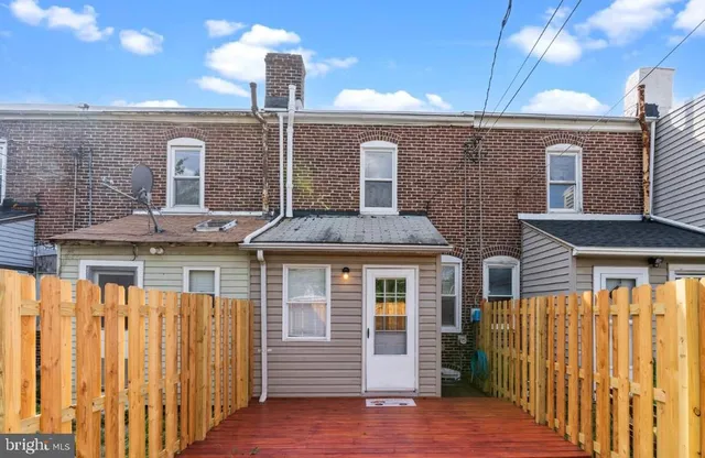 a front view of a house with a porch