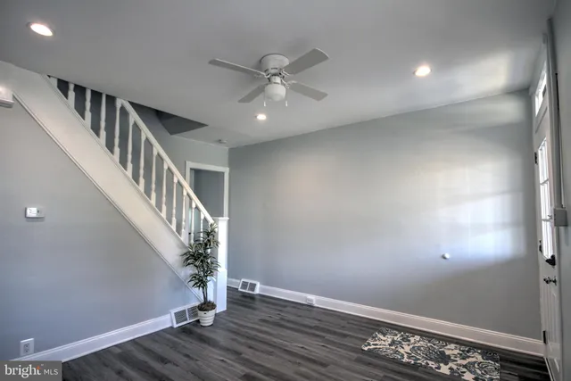 a view of entryway with wooden floor