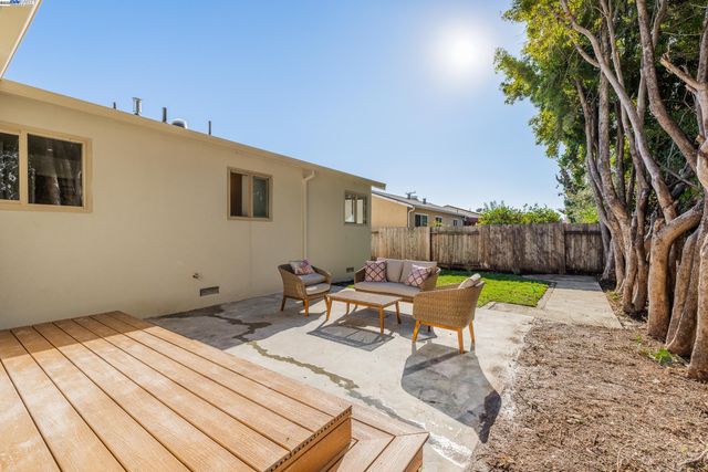 a view of a back yard of the house