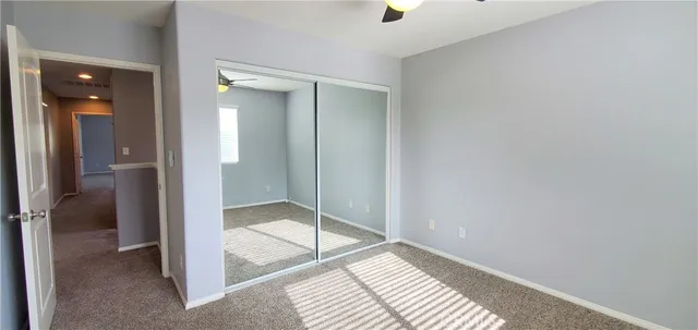 a view of a bathroom with a glass shower door