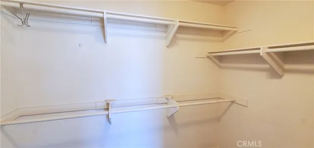 a view of a room with racks on the wall