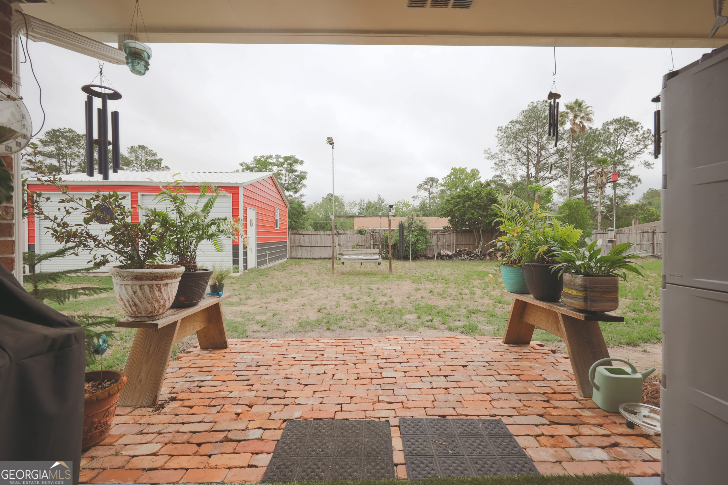 106 Beaver Drive Blackshear, GA 31516 - Photo 5 of 20 a view of a porch with a potted plant