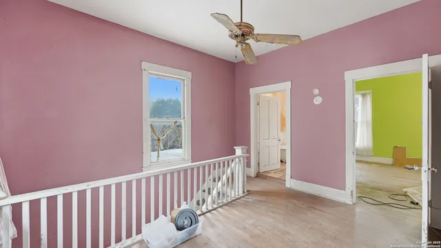 a bathroom with a toilet and a bathtub
