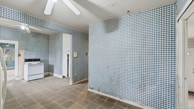 a view of an empty room and window