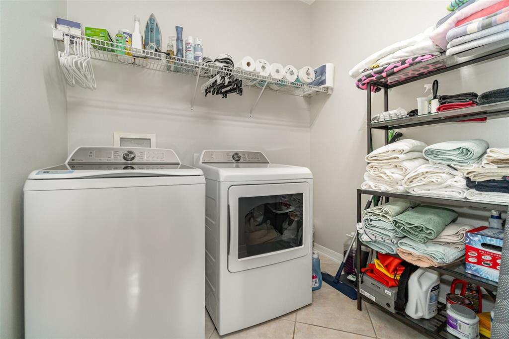 6905 Nobleton Drive Windermere, FL 34786 - Photo 21 of 41 a utility room with dryer and washer