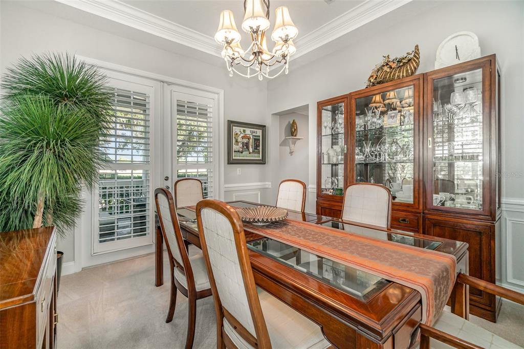 6905 Nobleton Drive Windermere, FL 34786 - Photo 10 of 41 a view of a dining room with furniture window and outside view