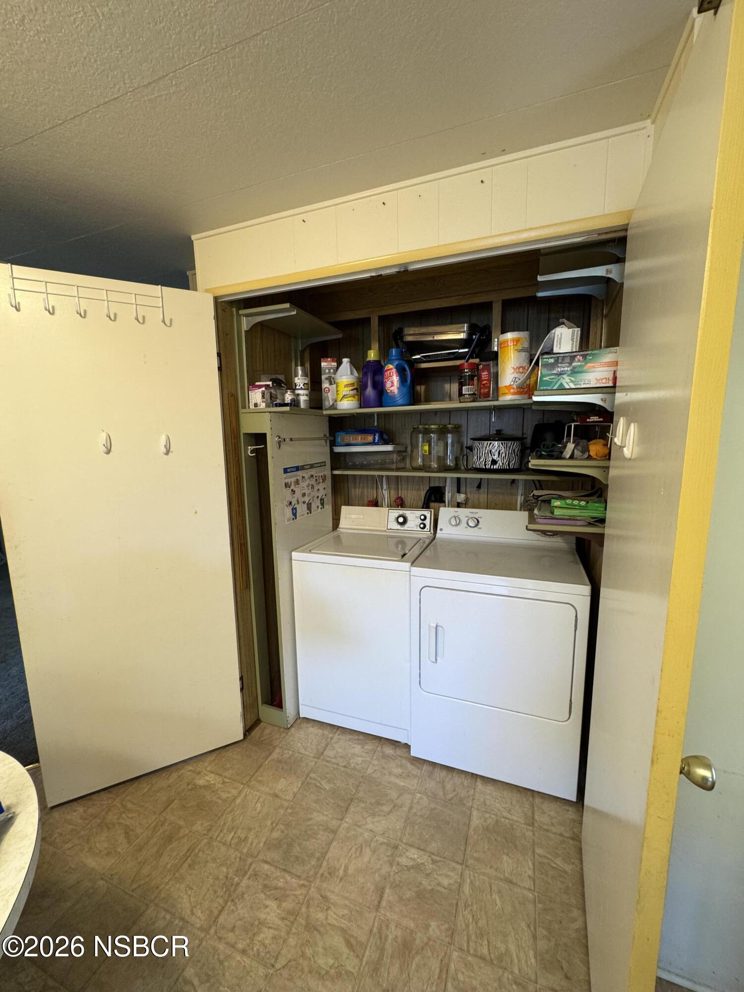 3210 Santa Maria Way, Unit 173 Santa Maria, CA 93455 - Photo 10 of 24 a kitchen with stainless steel appliances a refrigerator and a sink