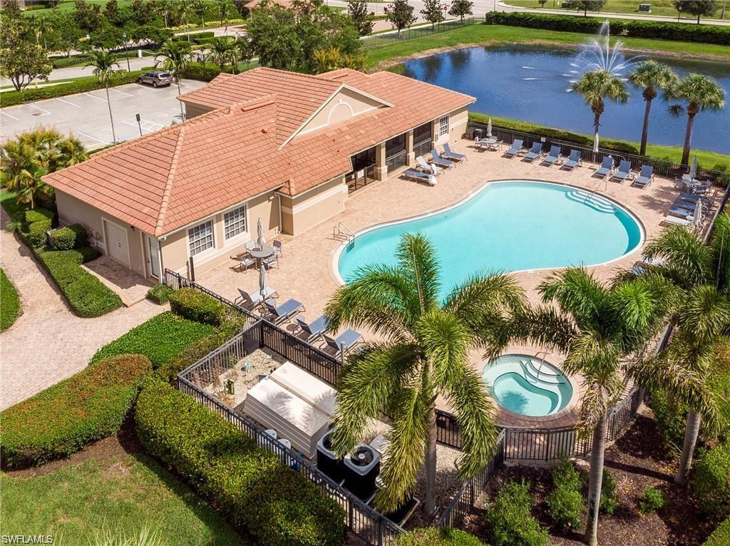 26502 Lucky Stone Road, Unit 101 Bonita Springs, FL 34135 - Photo 38 of 40 Birds eye view of property featuring a water view