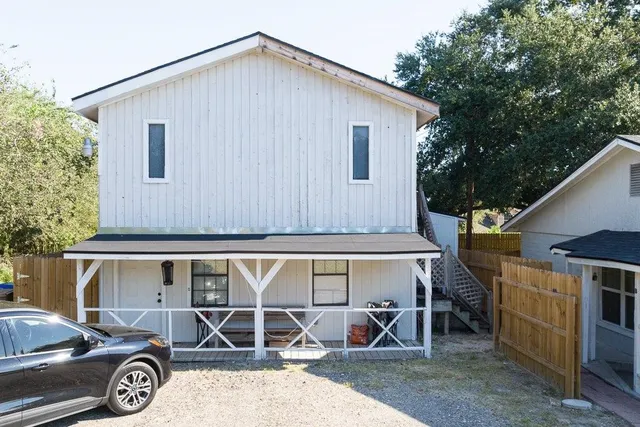 a view of a car park in front of house