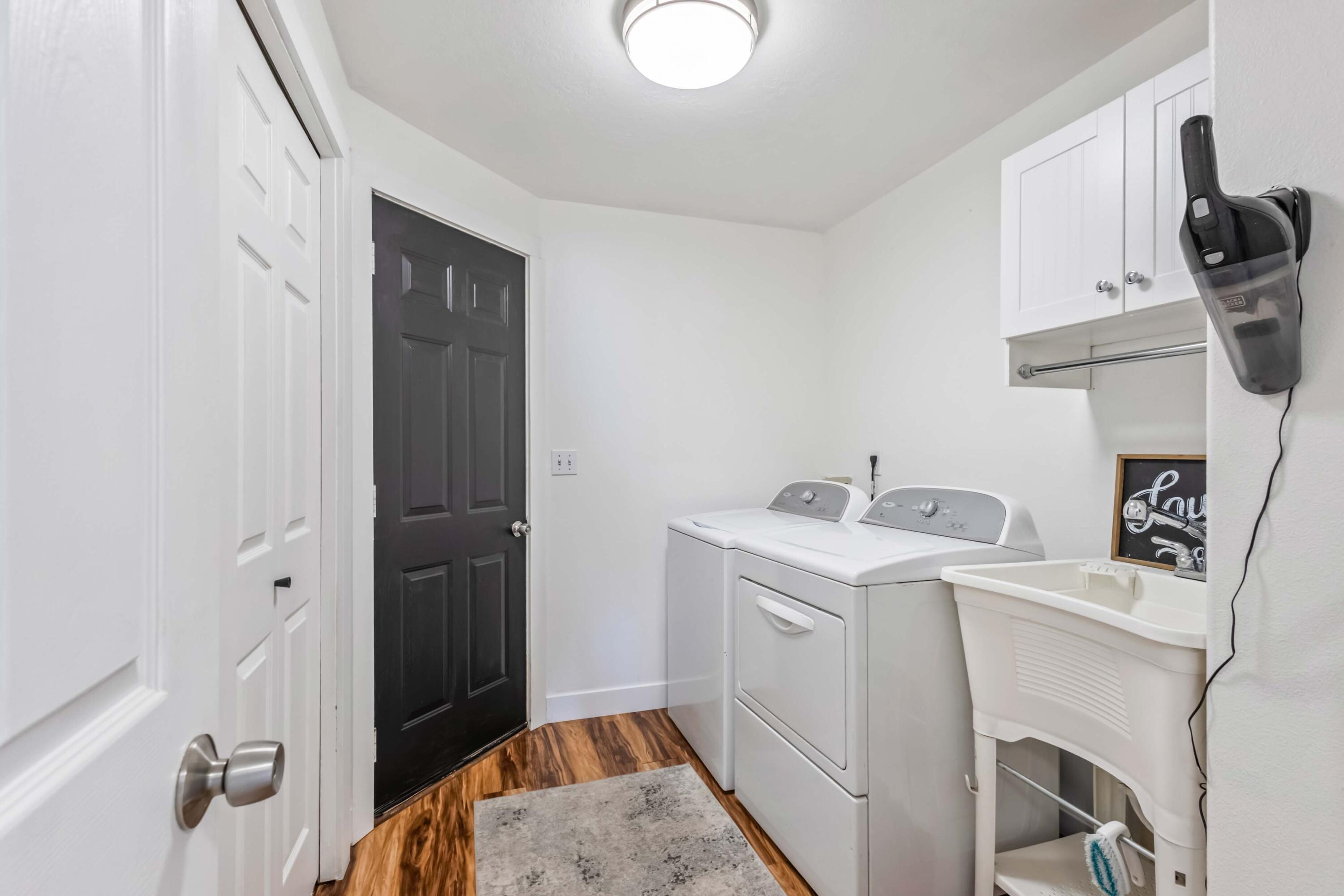 405 East D Street Culver, OR 97734 - Photo 21 of 49 a view of storage and utility room with washer and dryer