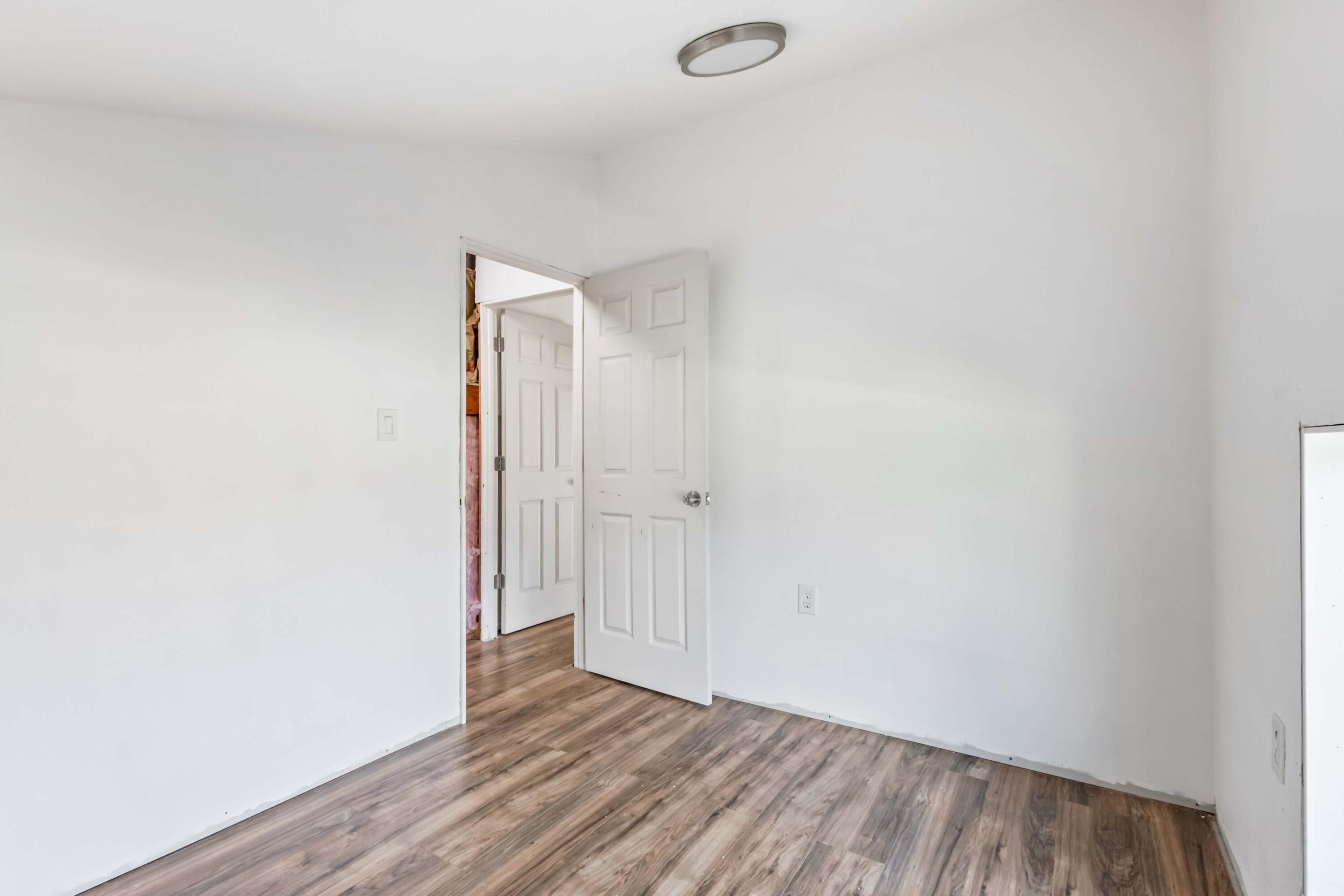 405 East D Street Culver, OR 97734 - Photo 22 of 49 a view of an empty room with wooden floor