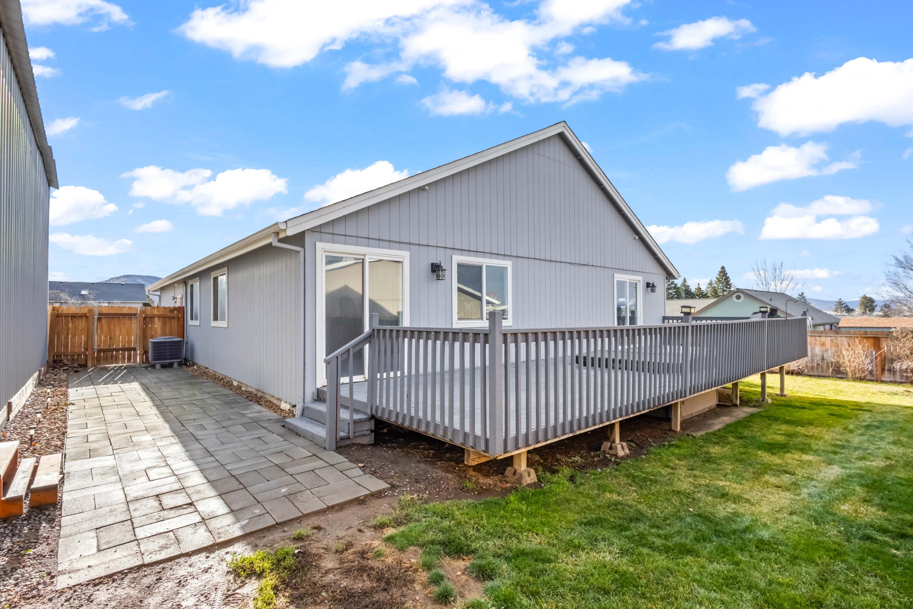 405 East D Street Culver, OR 97734 - Photo 37 of 49 a view of a house with a yard and deck