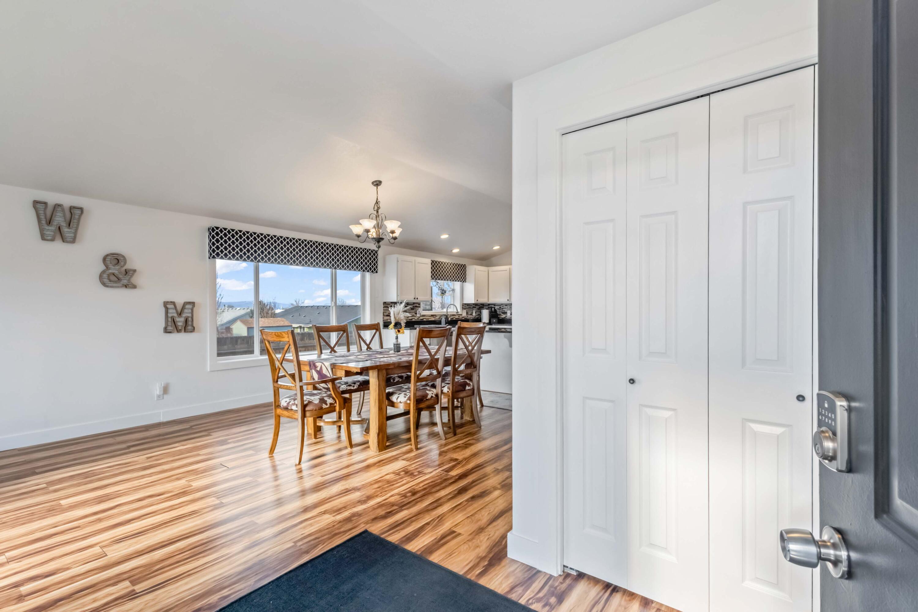 405 East D Street Culver, OR 97734 - Photo 5 of 49 a view of a dining room with furniture and wooden floor