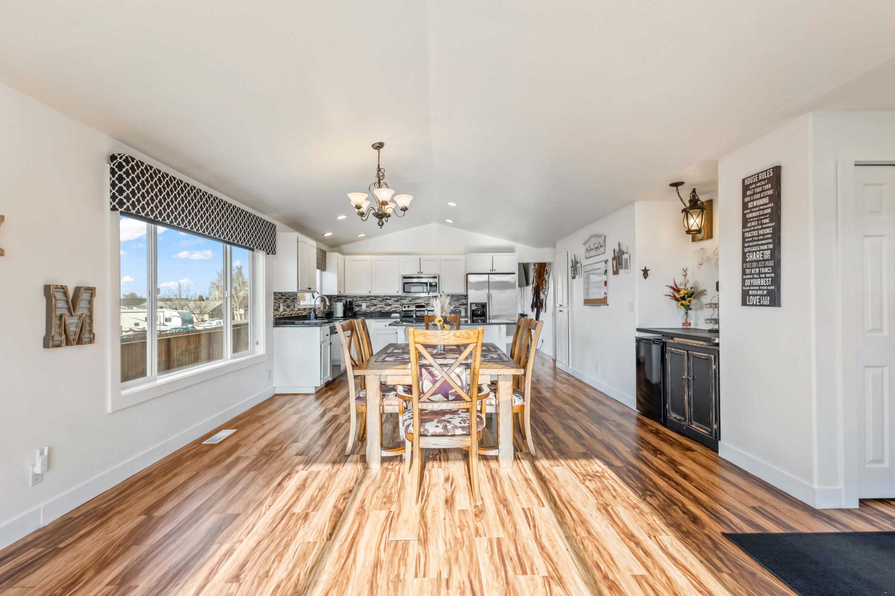 405 East D Street Culver, OR 97734 - Photo 6 of 49 a view of a dining room with furniture window and wooden floor