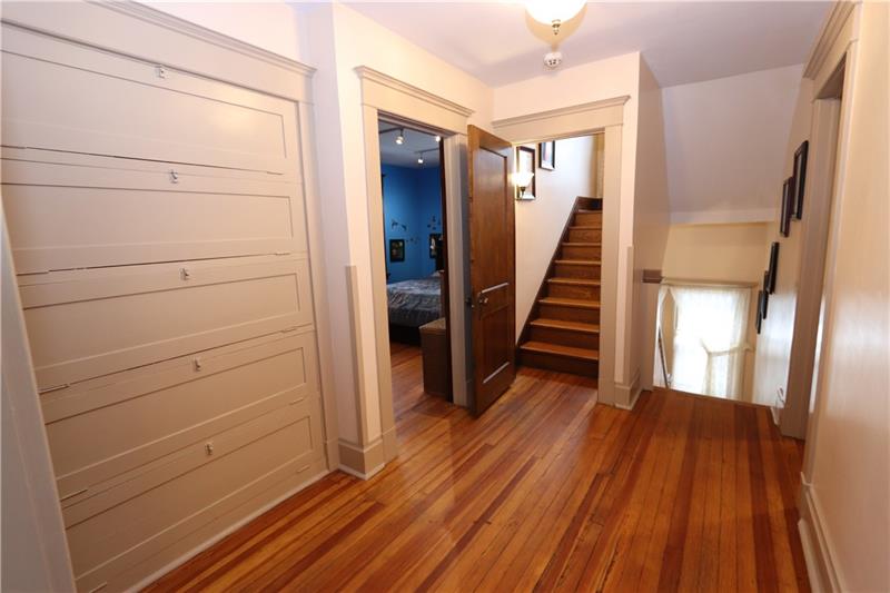 107 Edgecliff Road Carnegie, PA 15106 - Photo 9 of 25 2nd Floor landing with old-style blanket storage & stairs to 3rd floor.