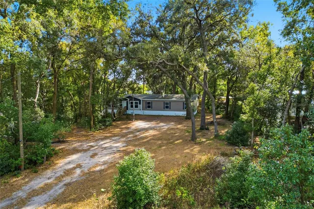 a view of swimming pool with a yard
