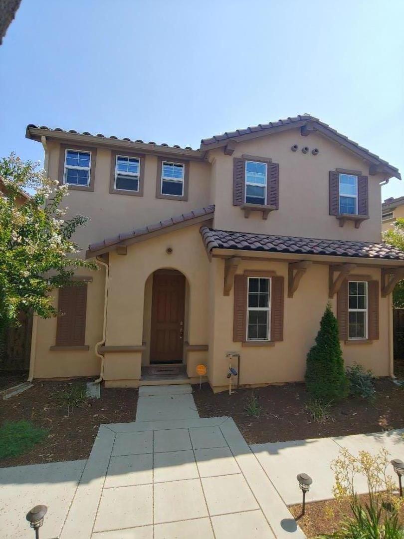 a house view with a outdoor space