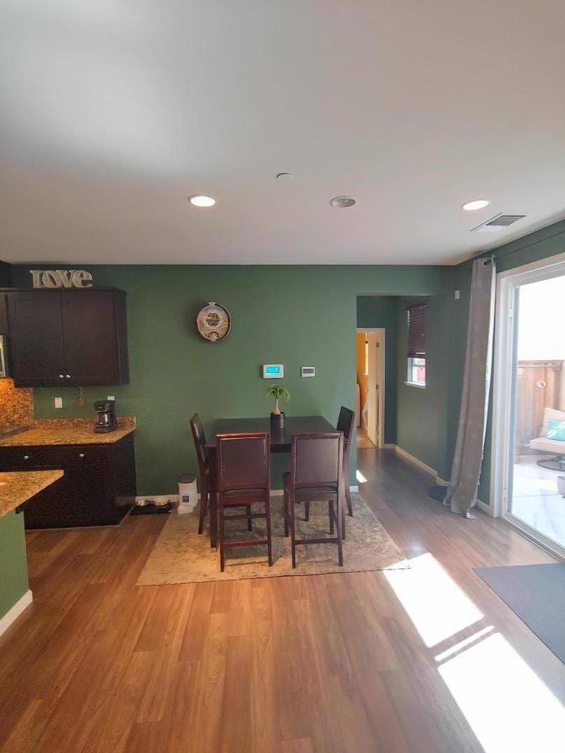 100 Caspian Way Gilroy, CA 95020 - Photo 3 of 7 a view of a dining room with furniture and window