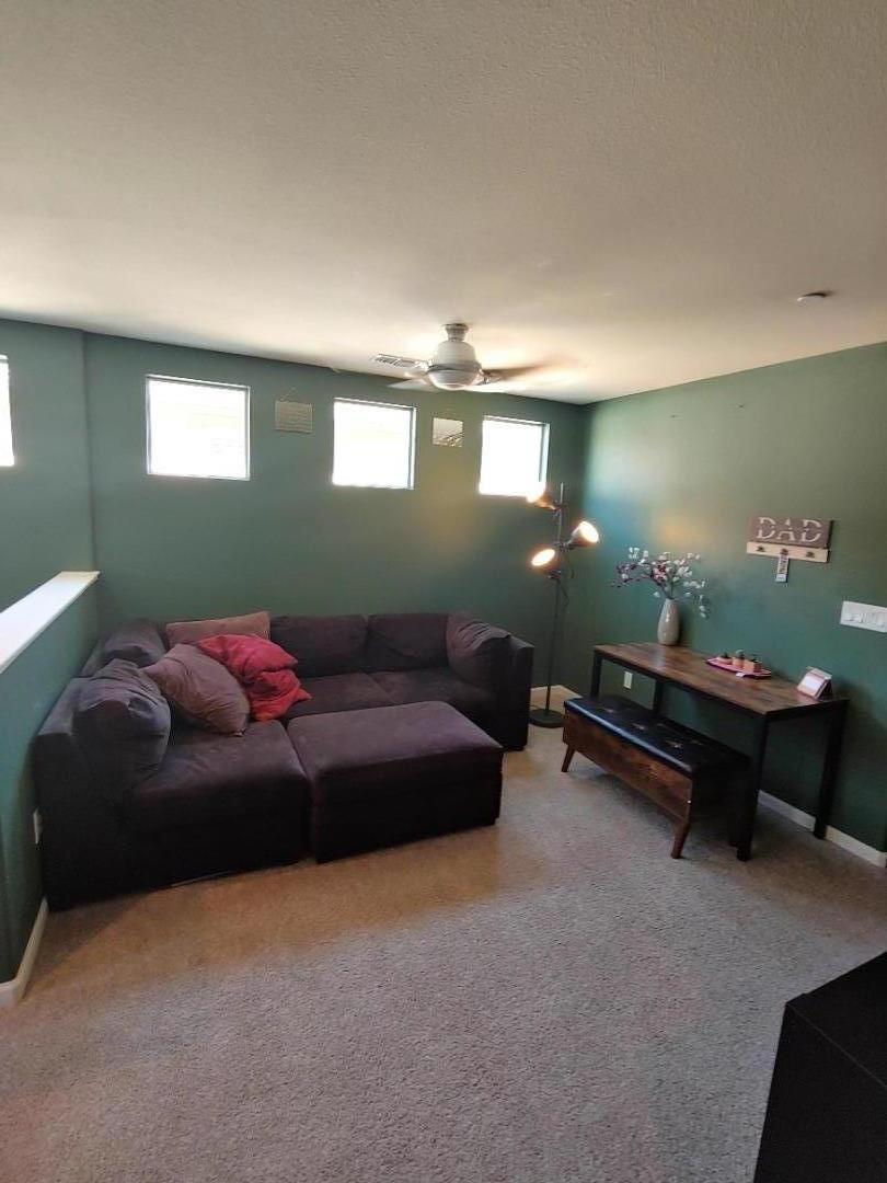 100 Caspian Way Gilroy, CA 95020 - Photo 5 of 7 a living room with furniture and window