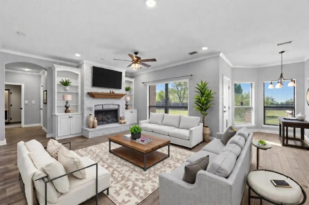 17821 Fm 3080 Mabank, TX 75147 - Photo 1 of 23 a living room with furniture a fireplace and a flat screen tv