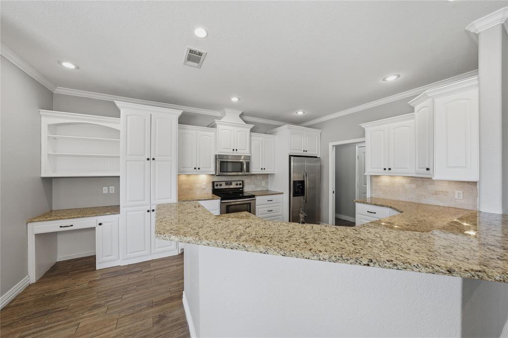 17821 Fm 3080 Mabank, TX 75147 - Photo 12 of 23 a large kitchen with kitchen island a sink stainless steel appliances and cabinets