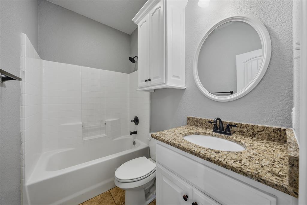 17821 Fm 3080 Mabank, TX 75147 - Photo 17 of 23 a bathroom with a granite countertop sink toilet and a mirror