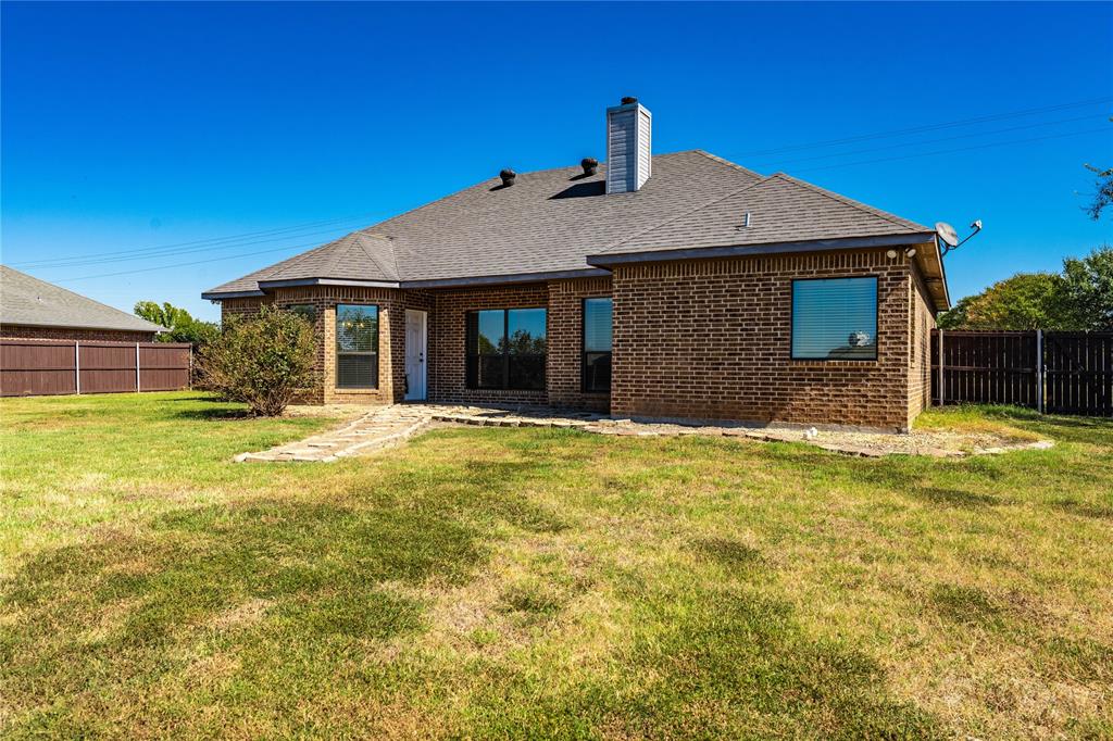 17821 Fm 3080 Mabank, TX 75147 - Photo 3 of 23 a front view of a house with a yard