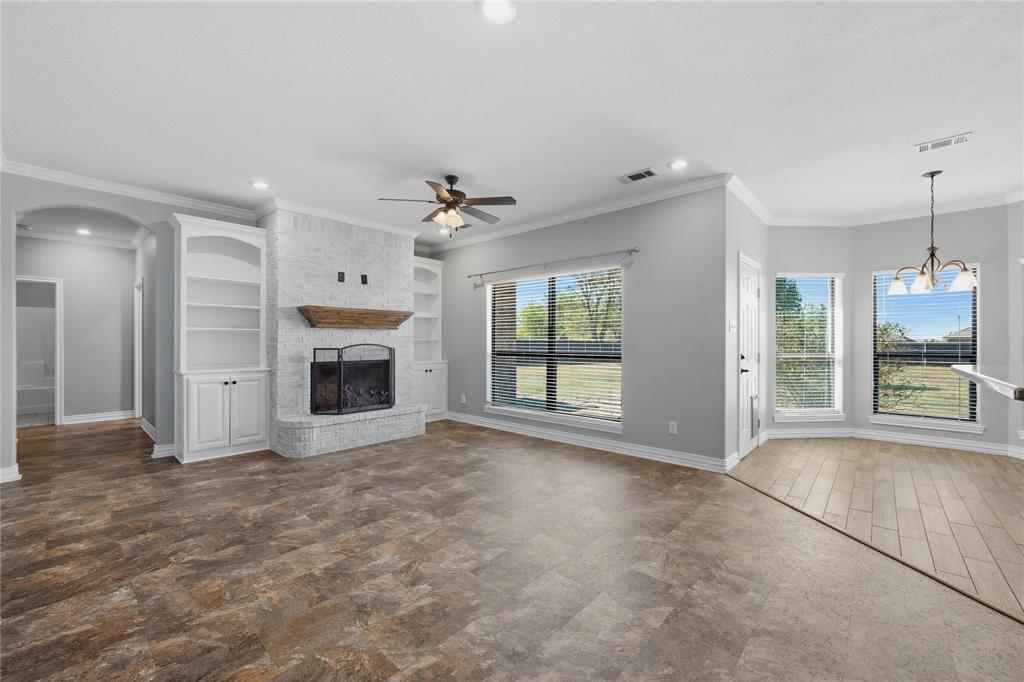17821 Fm 3080 Mabank, TX 75147 - Photo 5 of 23 a view of an empty room with a fireplace and a window