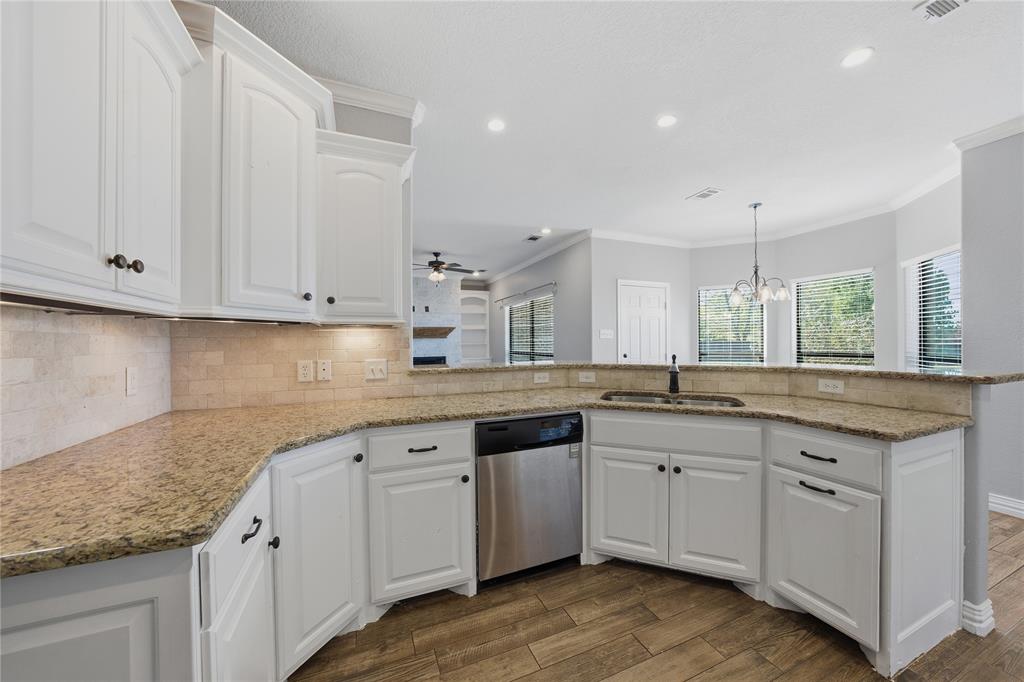 17821 Fm 3080 Mabank, TX 75147 - Photo 10 of 23 a kitchen with granite countertop white cabinets and white appliances