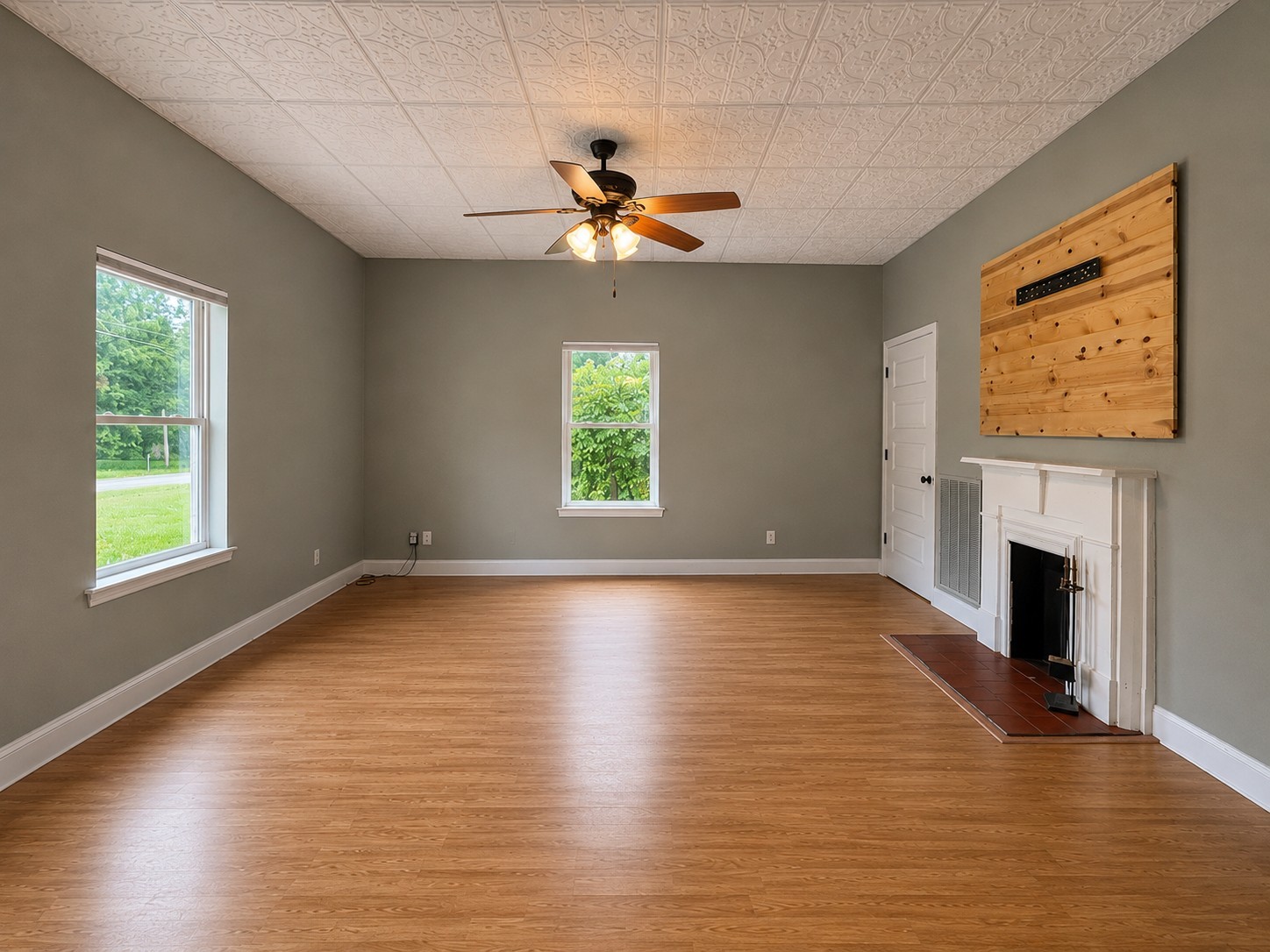 352 Main Street Cerulean, KY 42215 - Photo 12 of 32 a view of an empty room with window and wooden floor