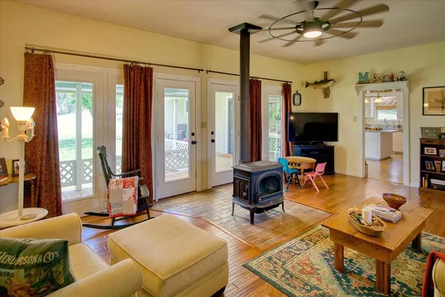 a view of a kitchen with furniture and a chandelier
