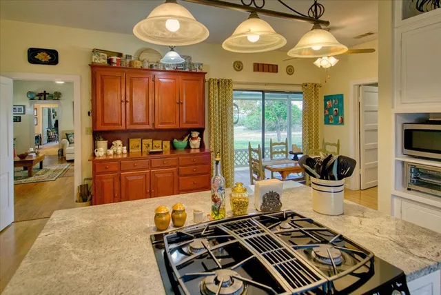 a bedroom with a bed and a table in it