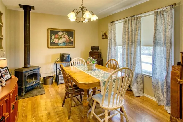 a view of a lake with houses in the back