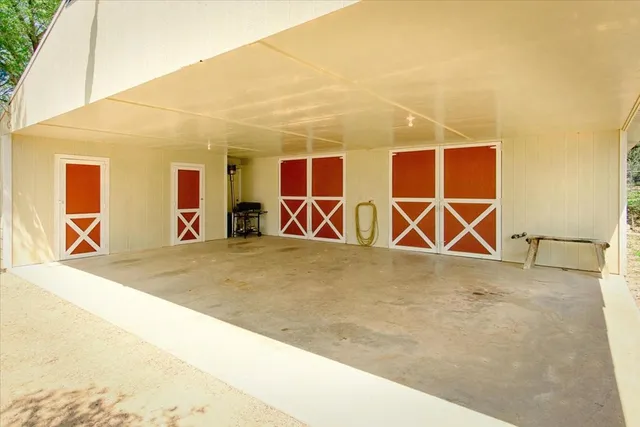 a view of a yard with a tree