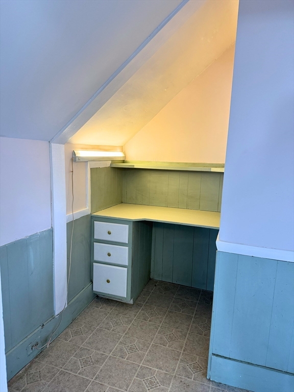 29 Fletcher Street, Unit 2 Ayer, MA 01432 - Photo 4 of 15 a room with a dresser