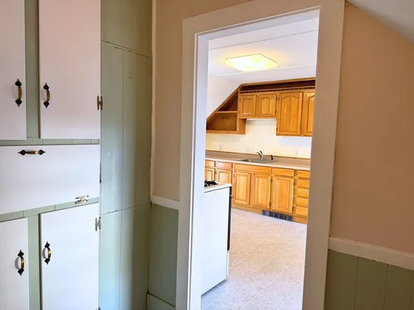 a en suite bathroom with a sink and mirror