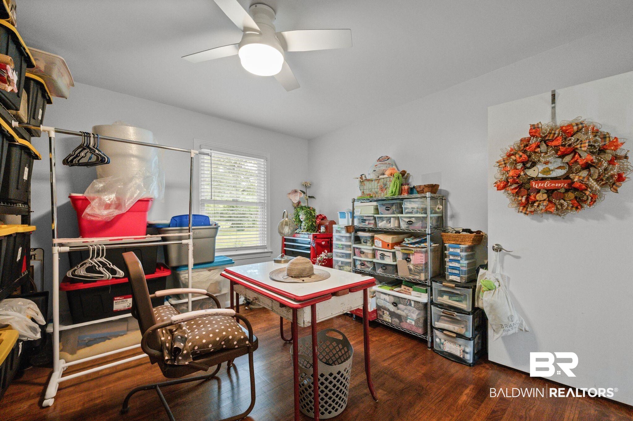 5417 Windmill Drive Mobile, AL 36693 - Photo 20 of 26 Room featuring wood-finish flooring, a ceiling fan with integrated lighting, and light-toned walls