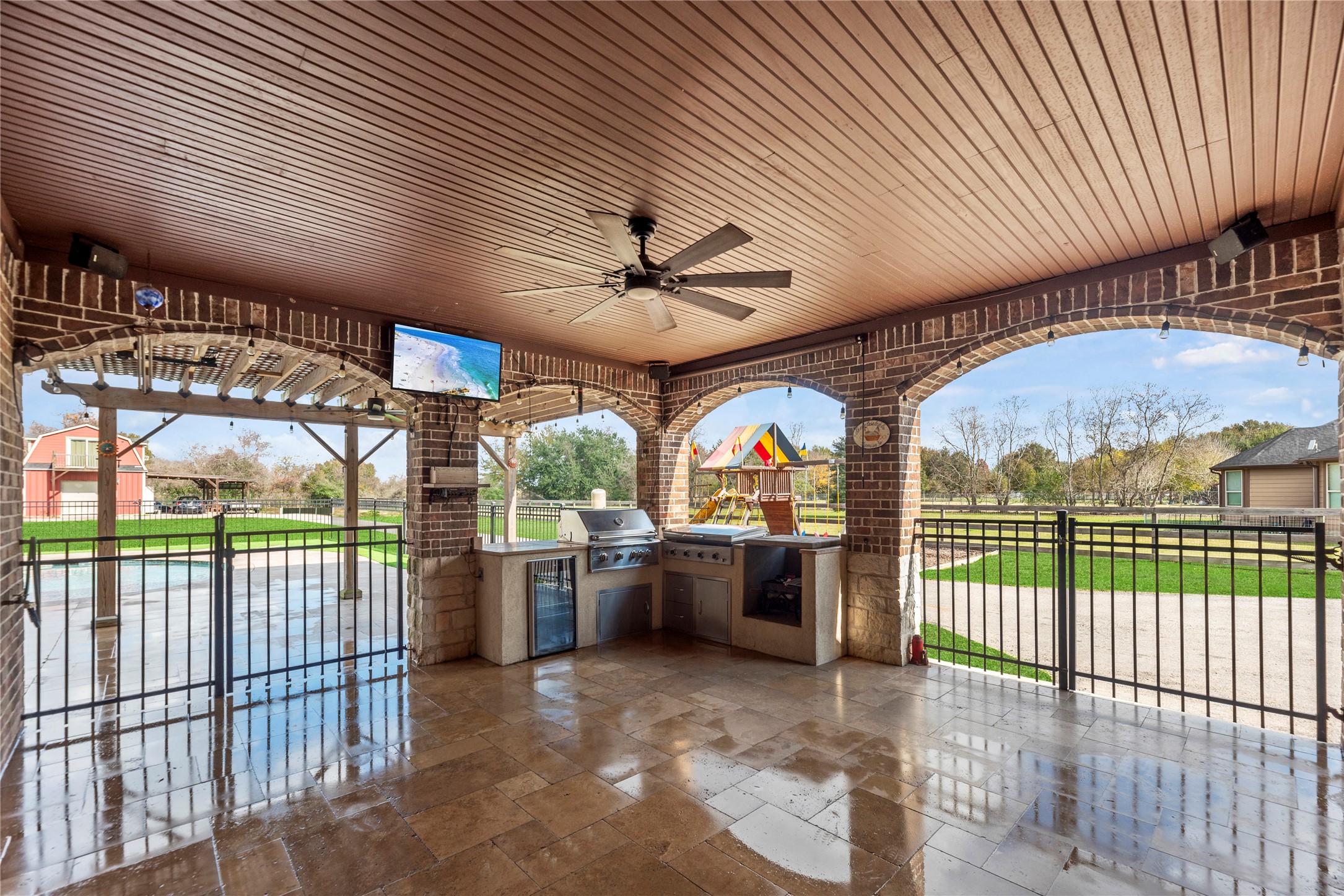 30914 Coco Street Cypress, TX 77433 - Photo 36 of 47 Outdoor kitchen under the covered patio.